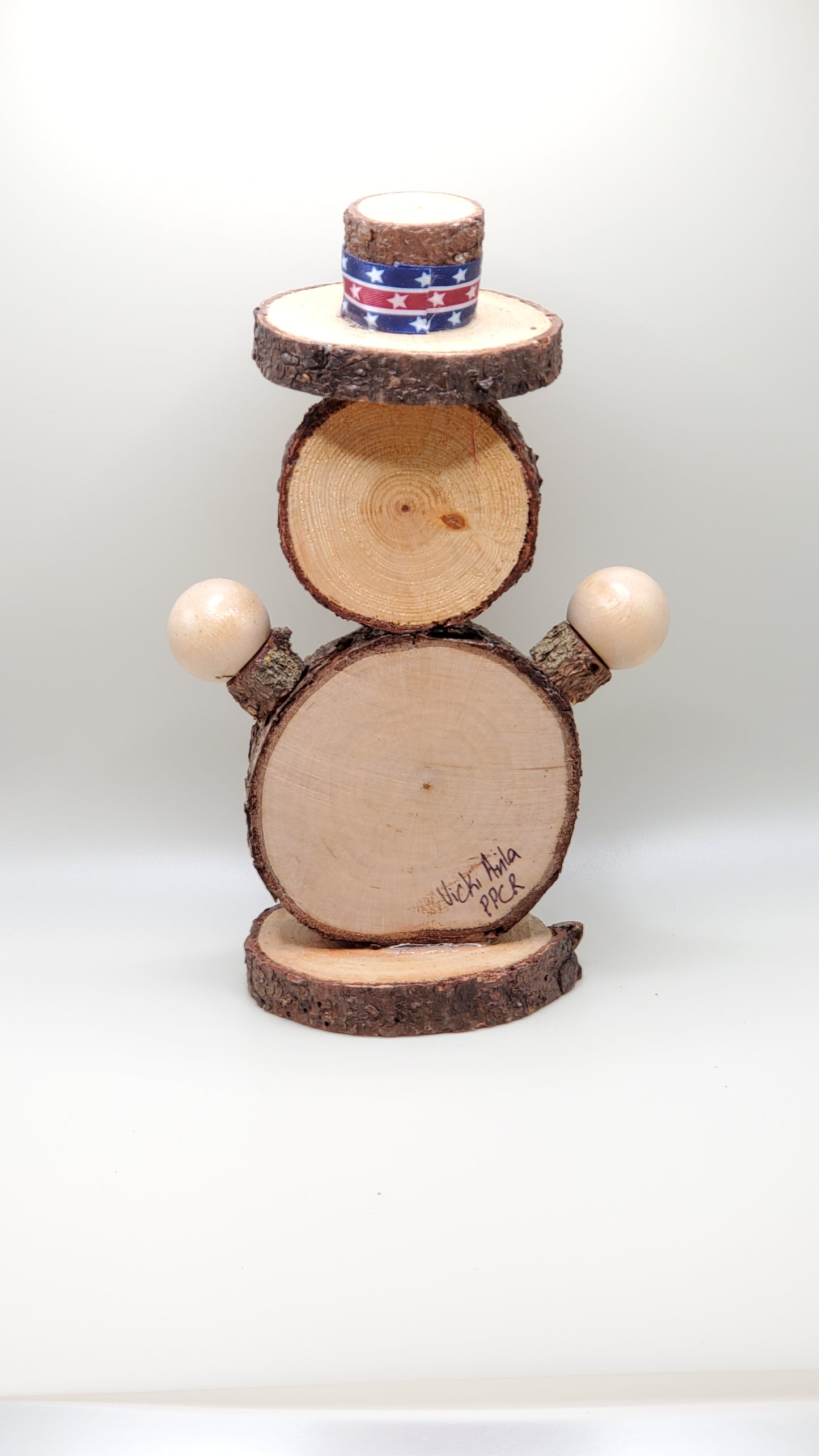 Wood round 4th of July guy