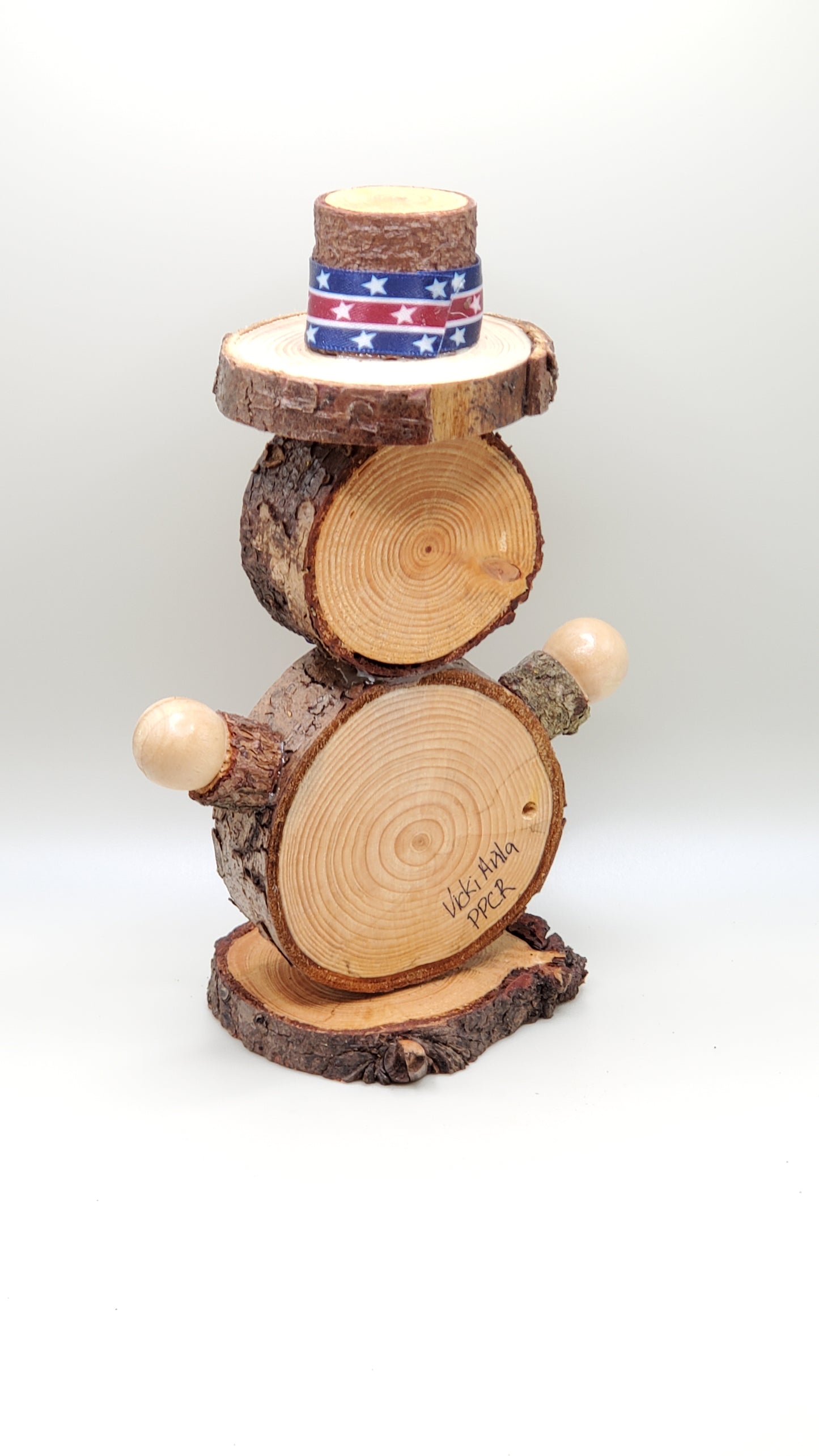 Wood round 4th of July guy