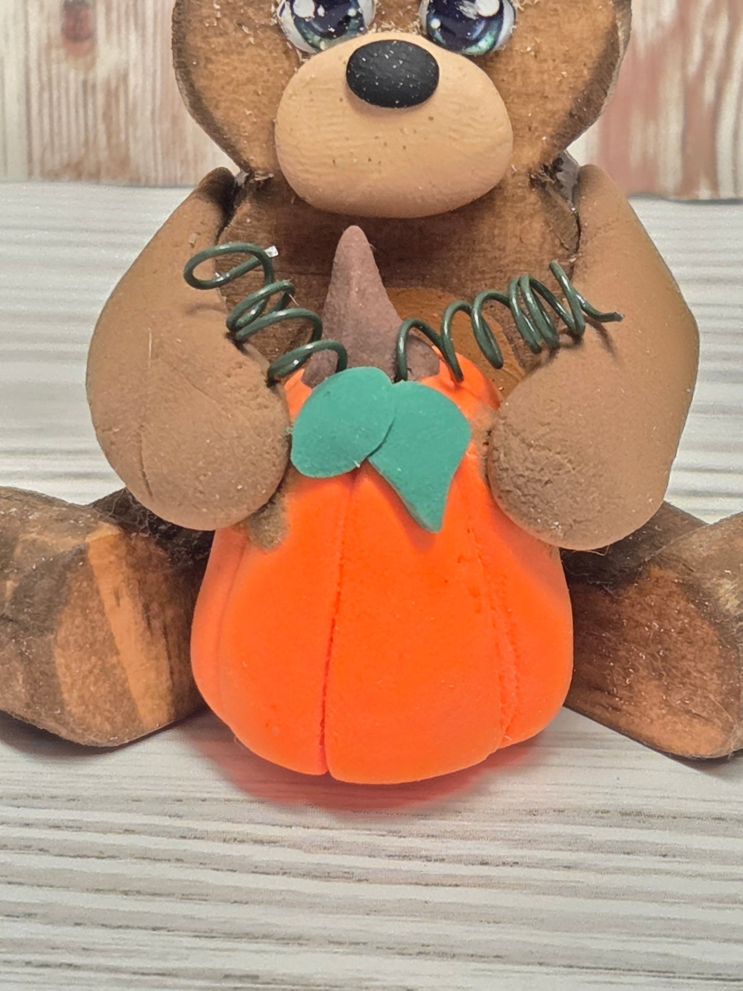 Sitting Wooden Bear with Pumpkin