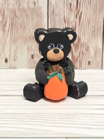 Sitting Wooden Bear with Pumpkin