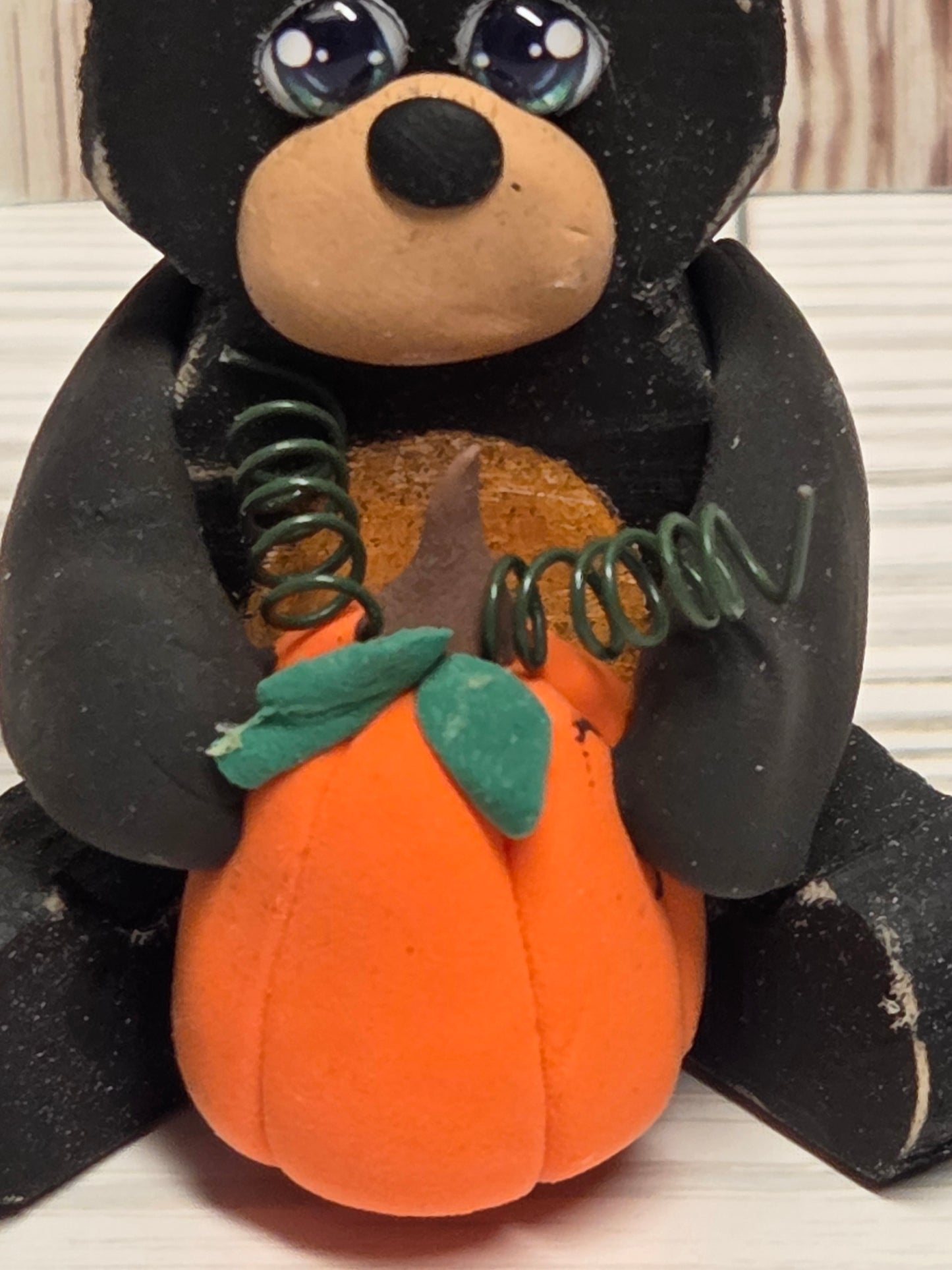 Sitting Wooden Bear with Pumpkin