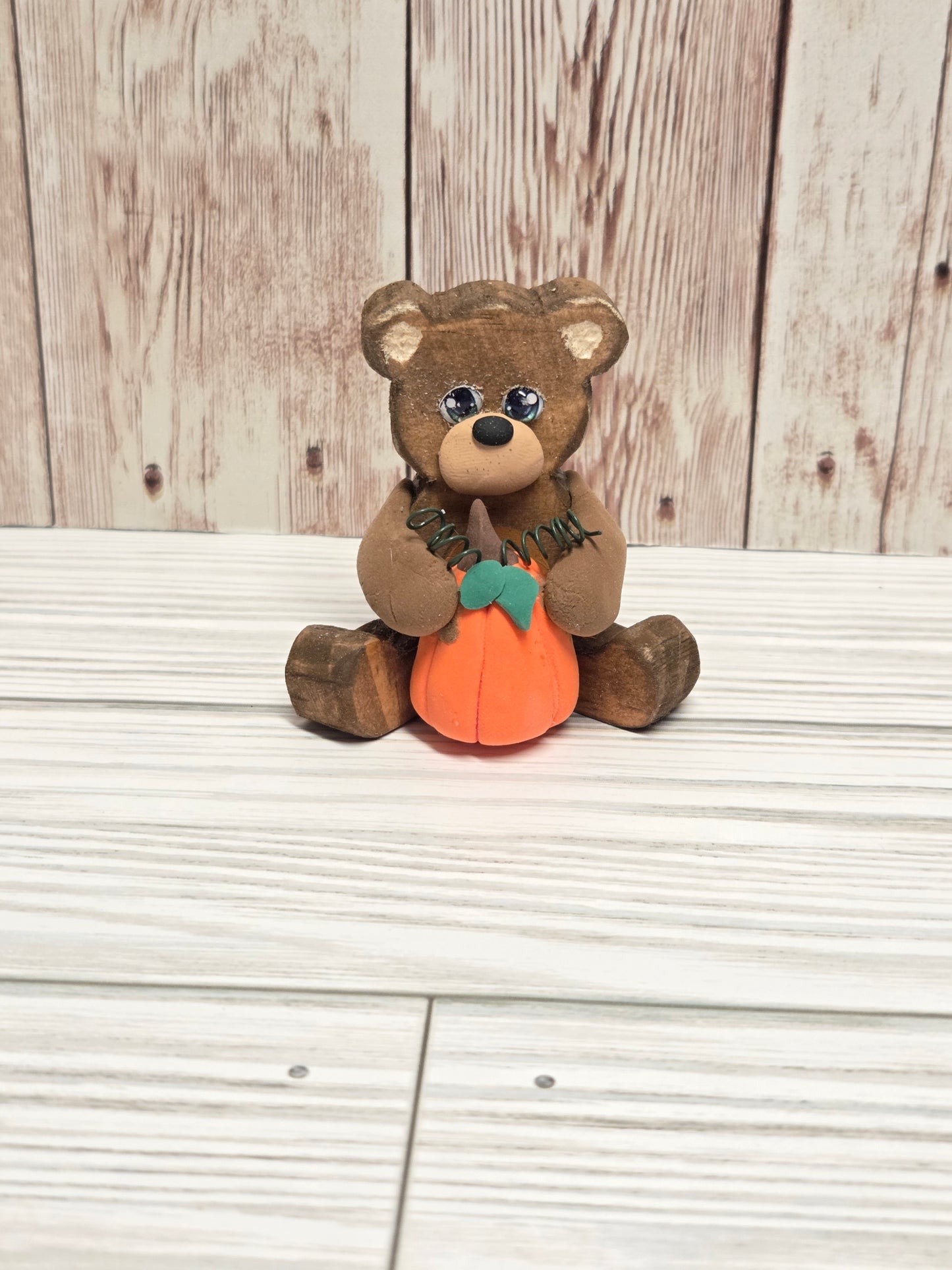 Sitting Wooden Bear with Pumpkin