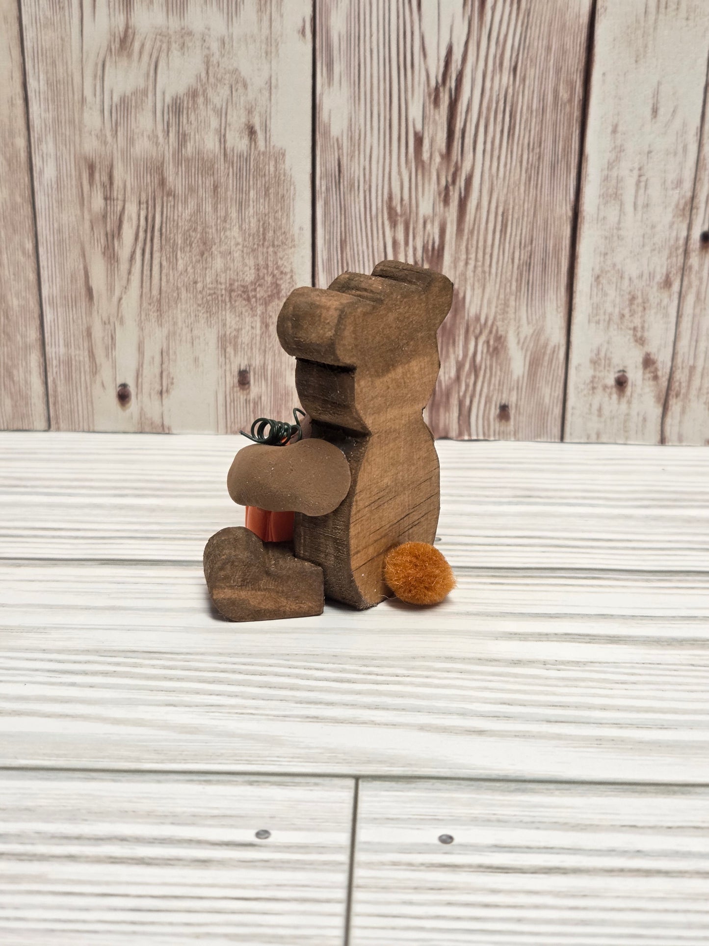 Sitting Wooden Bear with Pumpkin