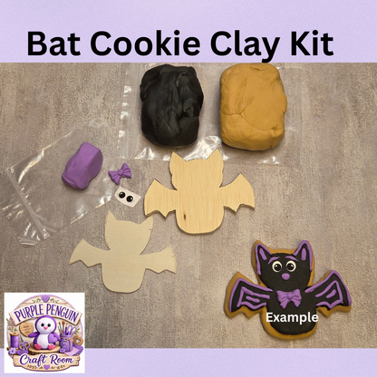 Bat Cookie Clay Kit with clay, two wooden bat pieces, eyes, purple bow, instructions and finished bat example