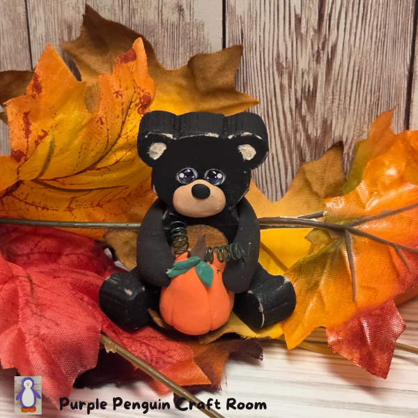 Sitting Wooden Bear with Pumpkin